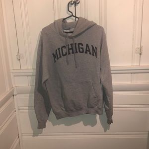 Grey and navy blue Michigan sweatshirt.
